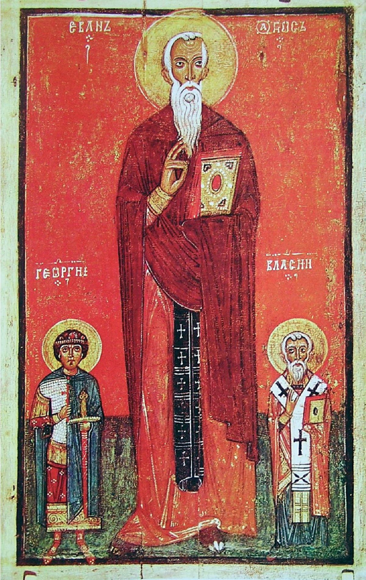 Рис. 44. Икона с изображением св. Иоанна, Власия и Георгия (фото Е.А. Рыбиной) Рис. 44. Икона с изображением св. Иоанна, Власия и Георгия (фото Е.А. Рыбиной)